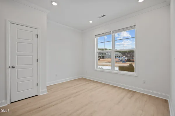 an empty room with an entryway