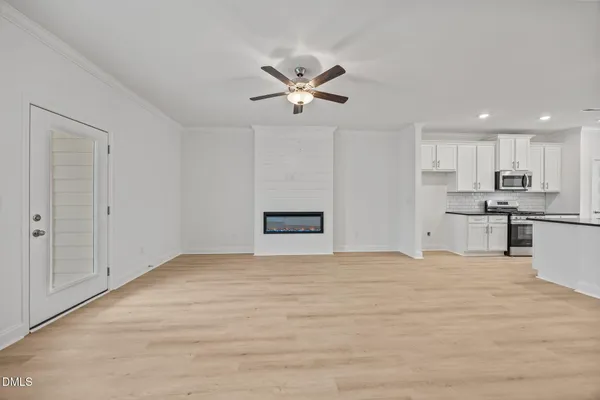 a view of an empty room with a window