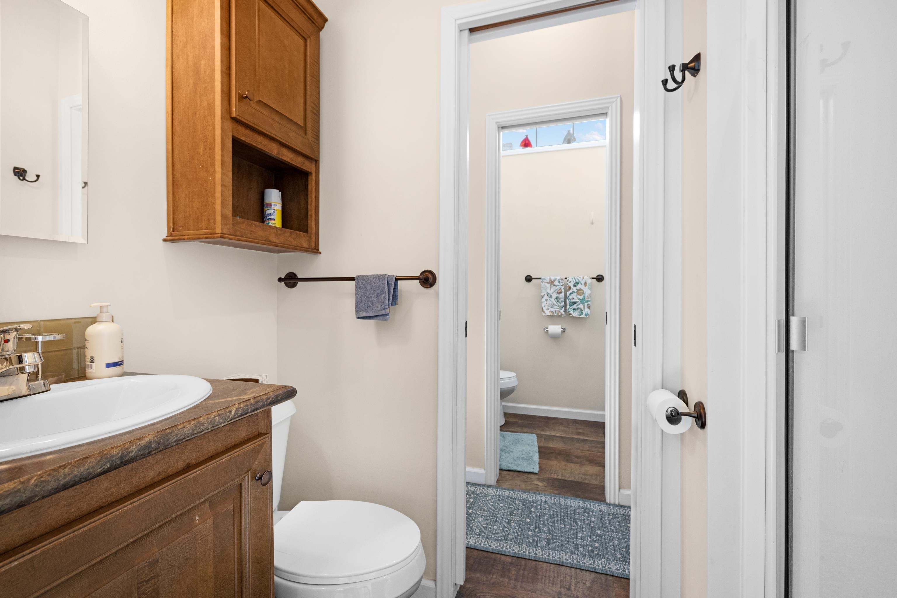 4100 Highway 9 Rio Grande, NJ 08242 - Photo 12 of 28 a bathroom with a granite countertop toilet sink and shower