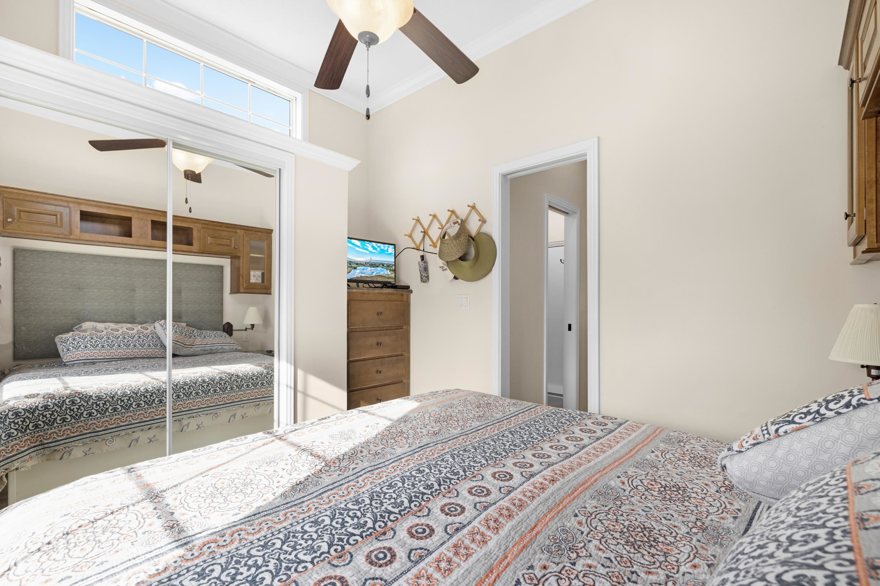 4100 Highway 9 Rio Grande, NJ 08242 - Photo 14 of 28 a bedroom with a bed and a large mirror on the dresser