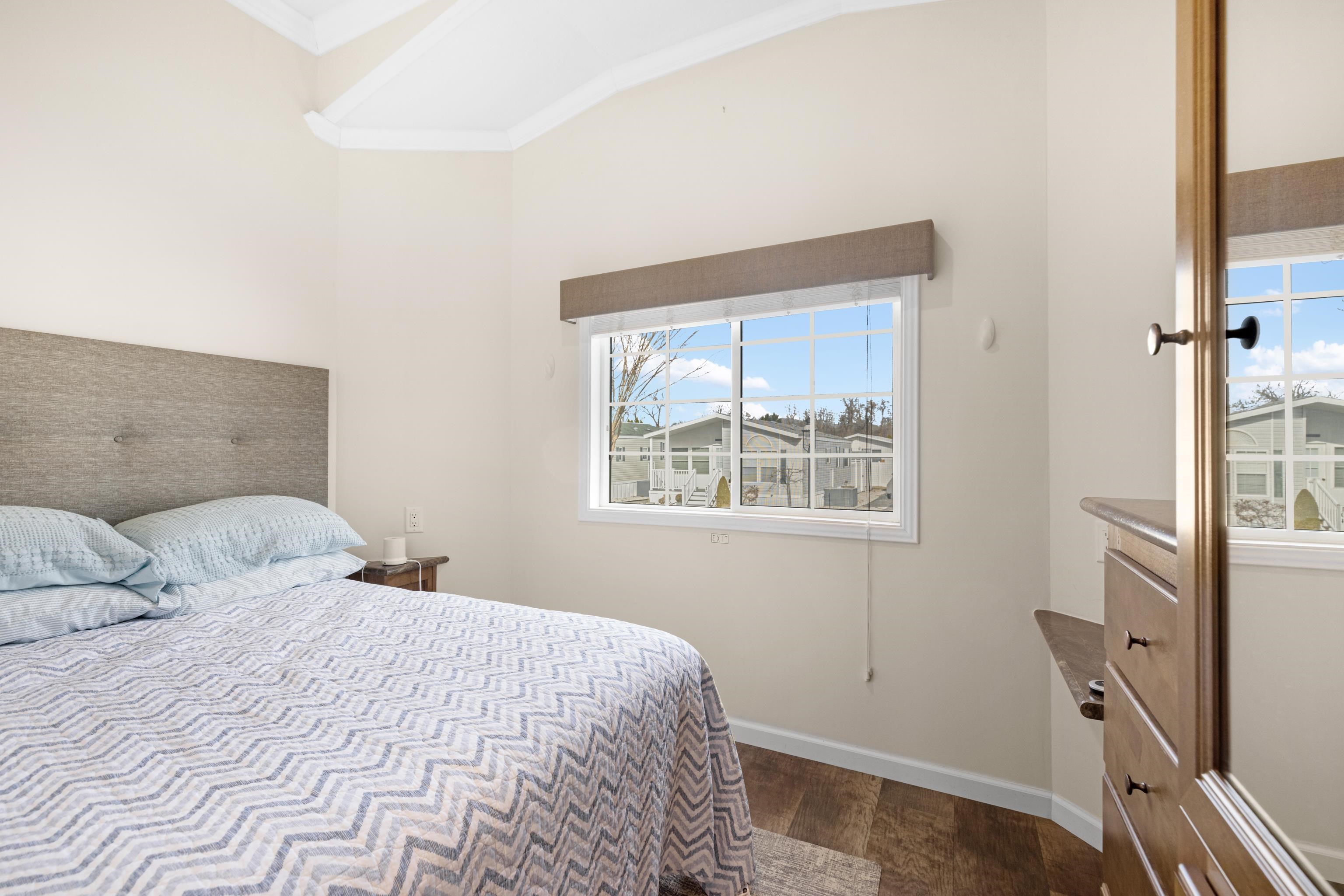 4100 Highway 9 Rio Grande, NJ 08242 - Photo 17 of 28 a bedroom with a bed and a window