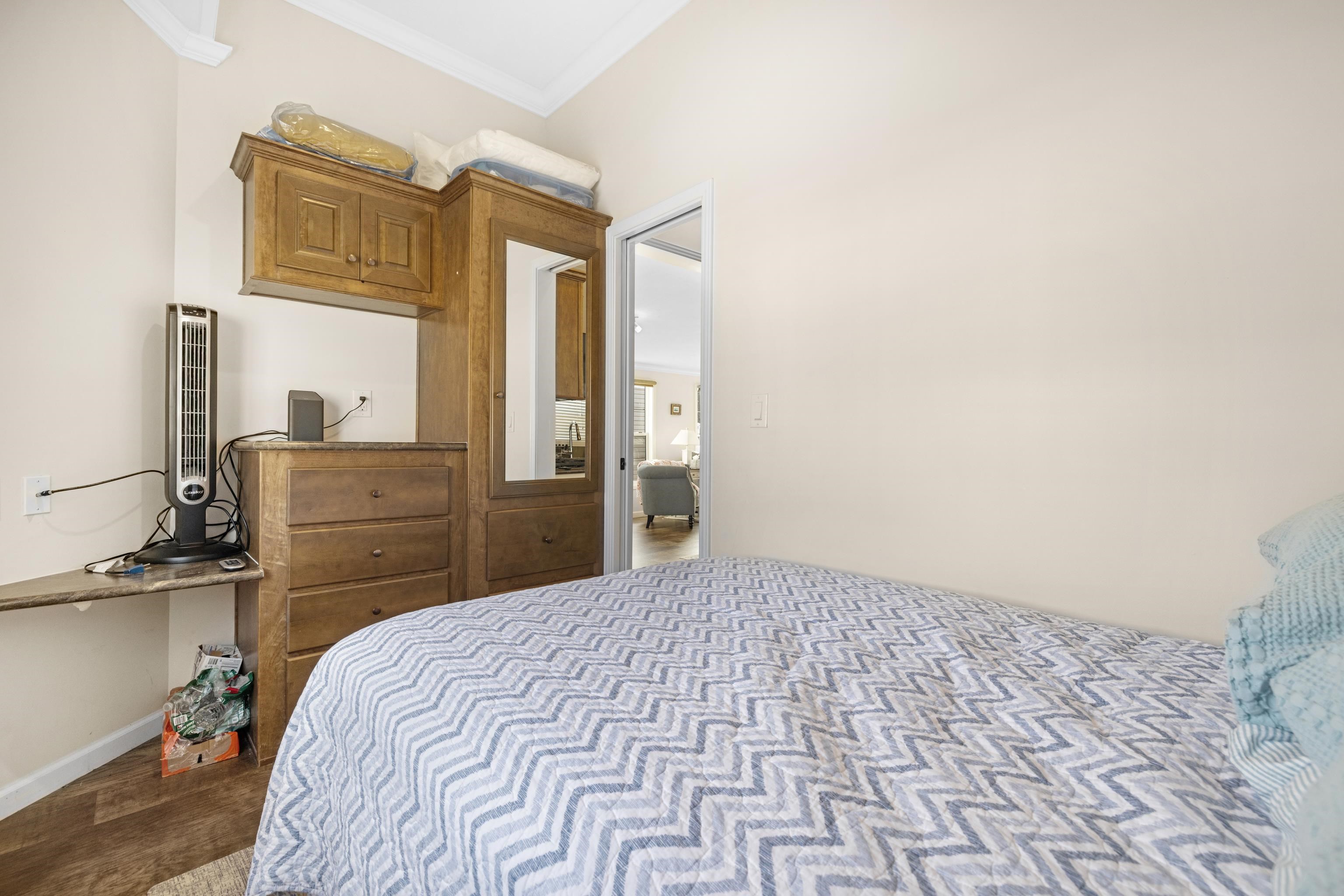 4100 Highway 9 Rio Grande, NJ 08242 - Photo 18 of 28 a bedroom with a bed and cabinets