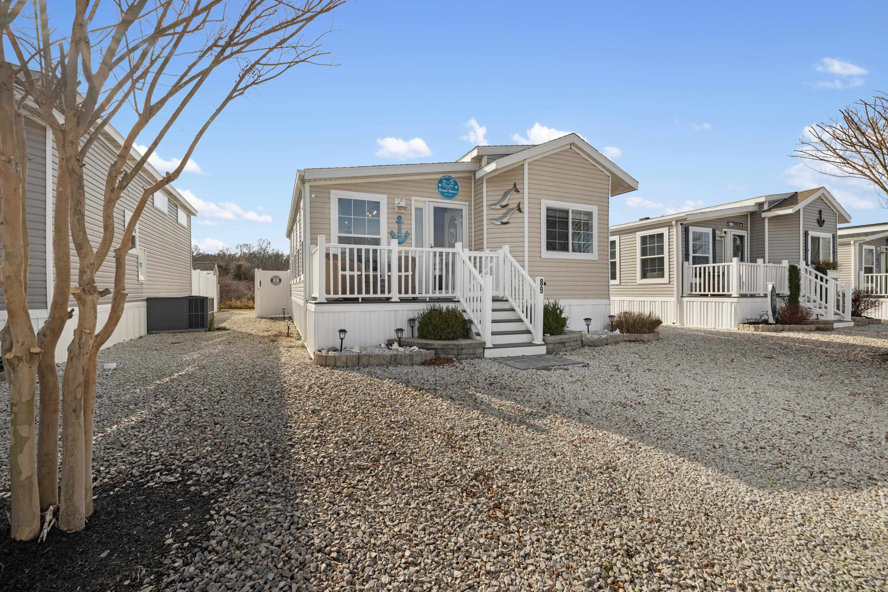 4100 Highway 9 Rio Grande, NJ 08242 - Photo 2 of 28 a front view of a house with a yard