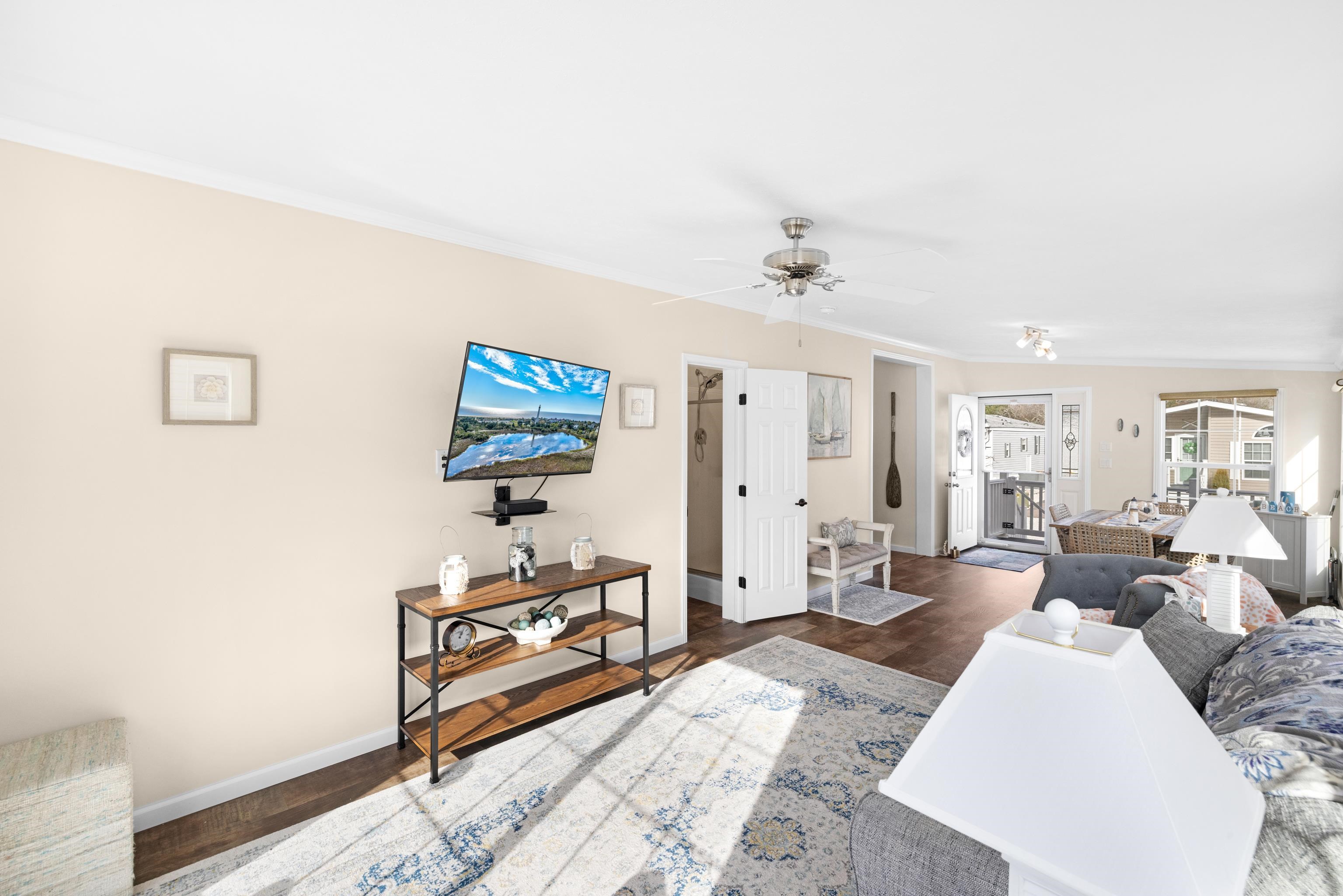4100 Highway 9 Rio Grande, NJ 08242 - Photo 6 of 28 a living room with furniture and a flat screen tv