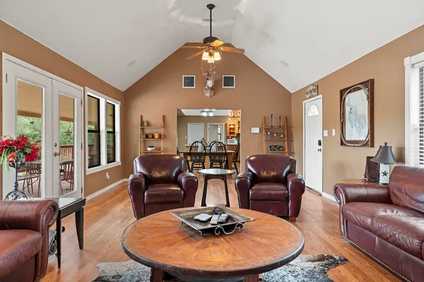 a living room with furniture and a window