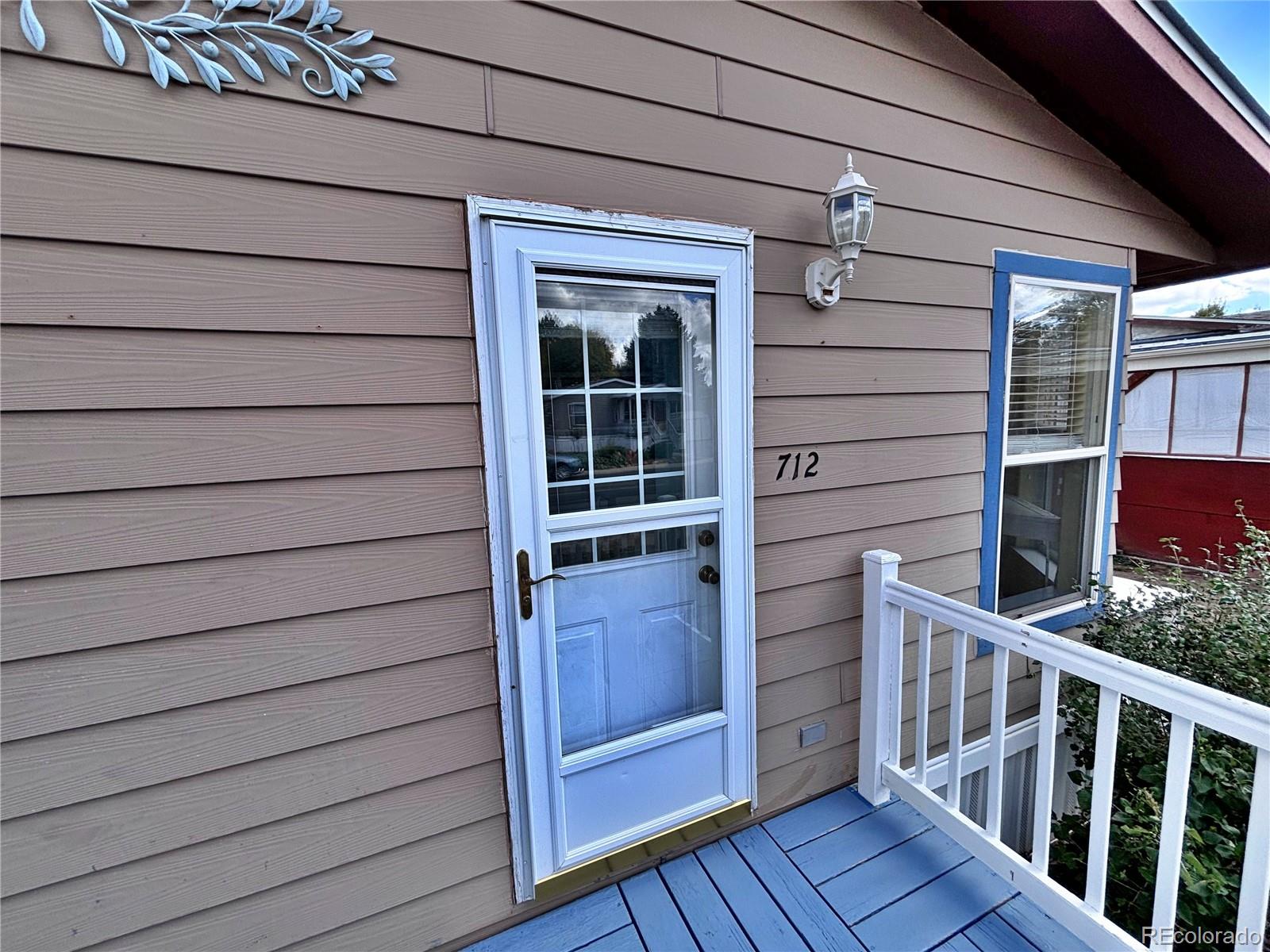 712 Meadowlark Drive Lafayette, CO 80026 - Photo 11 of 40 a view of front door