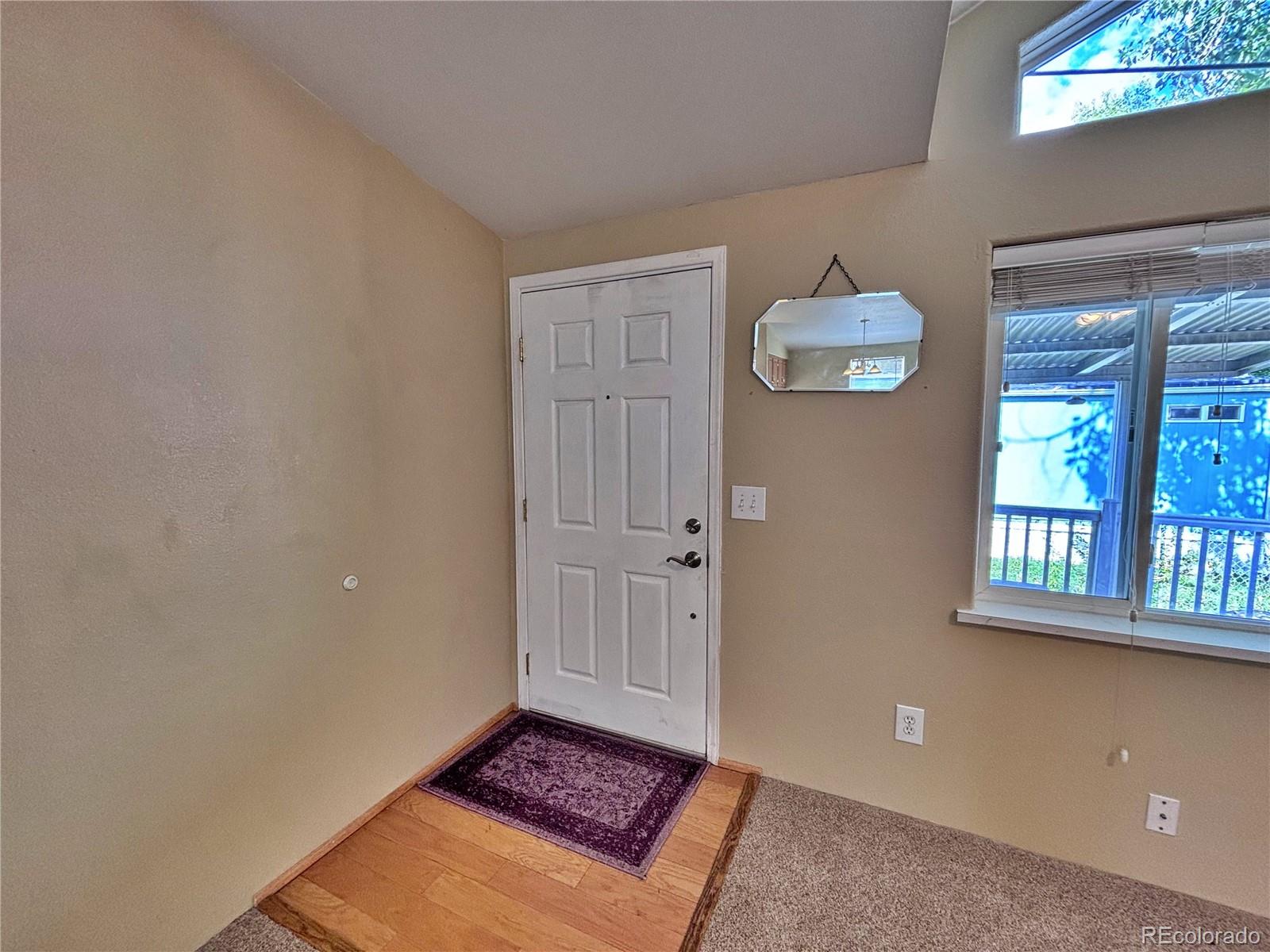 712 Meadowlark Drive Lafayette, CO 80026 - Photo 12 of 40 a view of an empty room and window