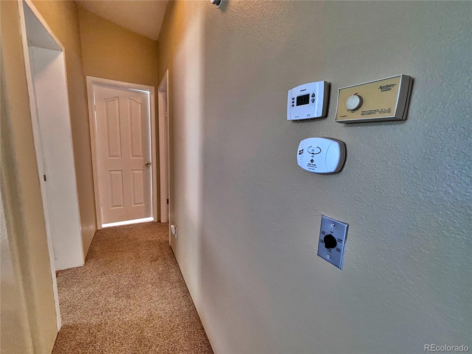 712 Meadowlark Drive Lafayette, CO 80026 - Photo 32 of 40 a view of a hallway with elevator