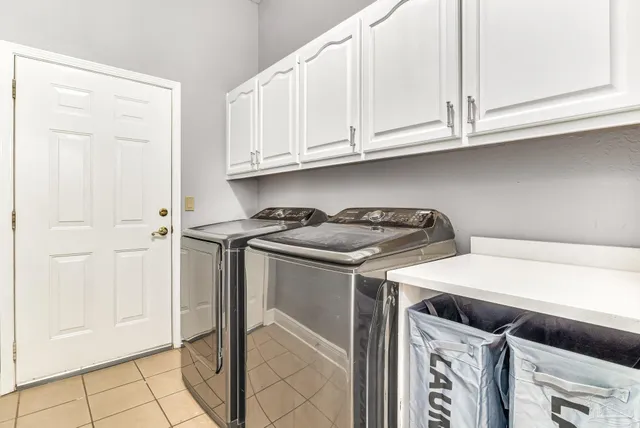 a utility room with dryer and washer