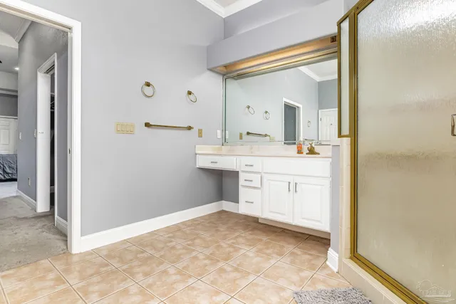 a bathroom with a sink a vanity and a mirror