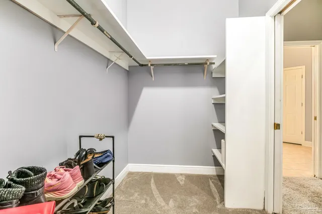 a view of a room with racks on the wall