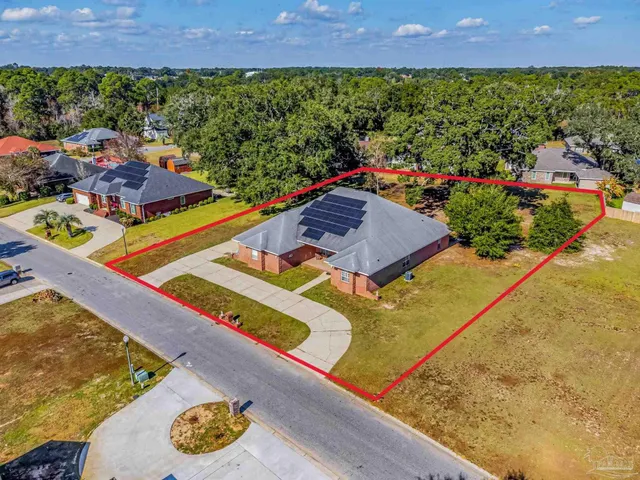 a view of an swimming pool with a patio