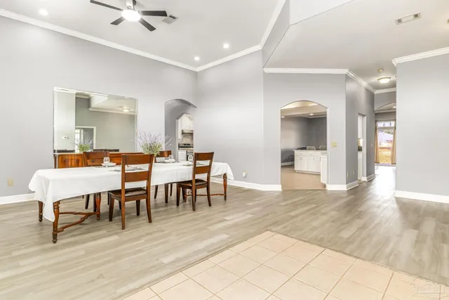 a view of a a dining room with furniture