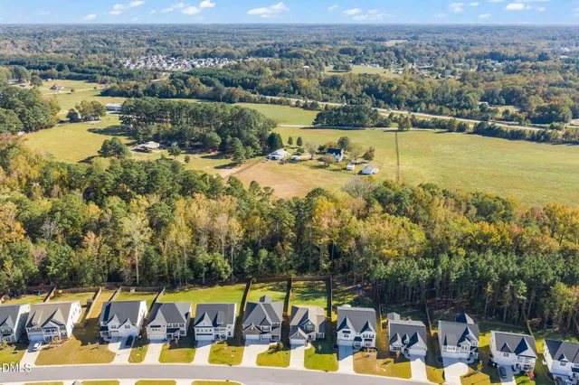 a view of a city and mountains ocean view