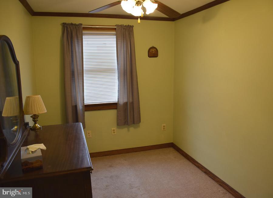 7925 Wynbrook Road Baltimore, MD 21224 - Photo 12 of 15 a room with a window
