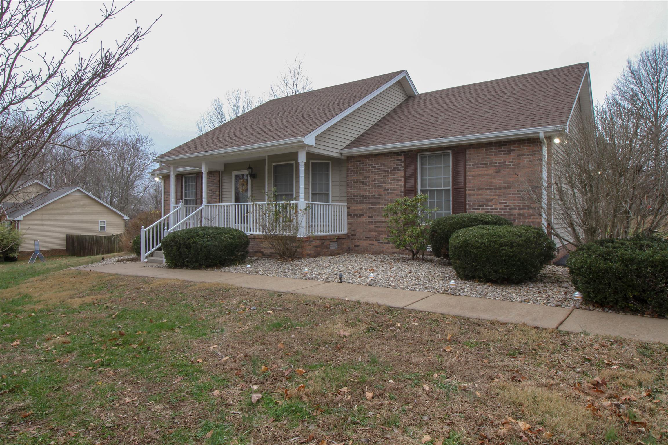 807 Hunters Crossing Lane Springfield, TN 37172 - Photo 2 of 16 a front view of a house with a yard and garage