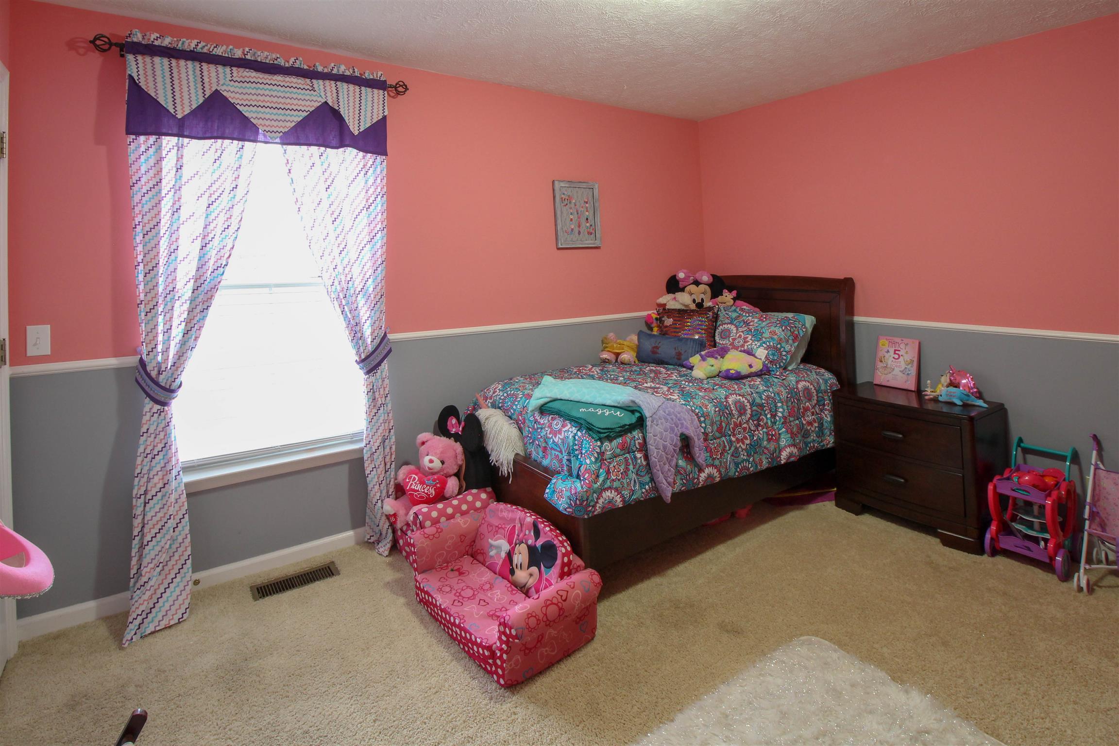 807 Hunters Crossing Lane Springfield, TN 37172 - Photo 15 of 16 a bedroom with bed and a window