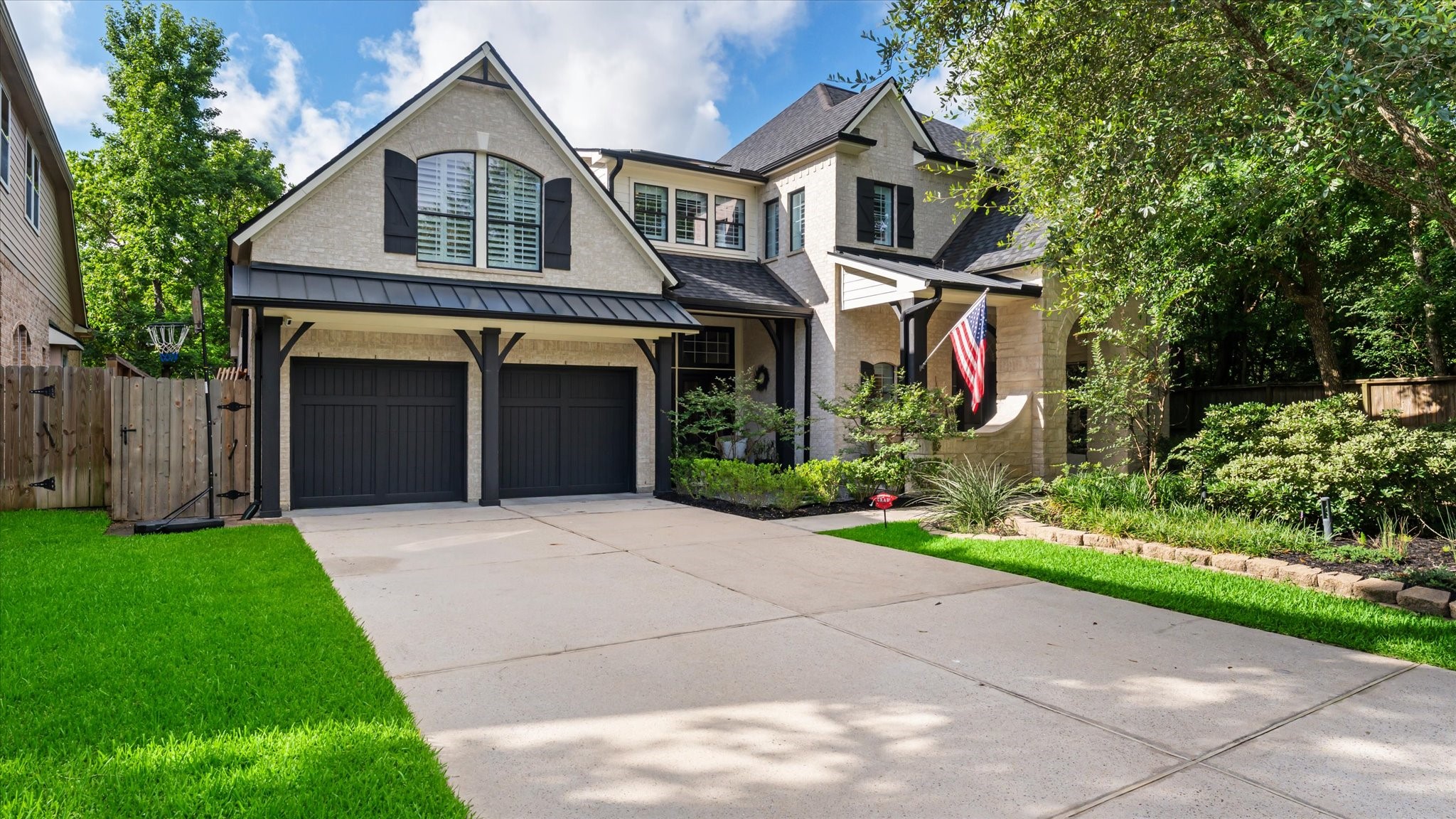 2 South Winsome Path Circle Spring, TX 77382 - Photo 1 of 47 a front view of a house with a yard and garage