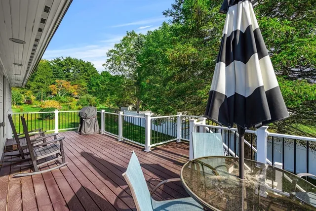 a view of a chairs and table on the wooden floor