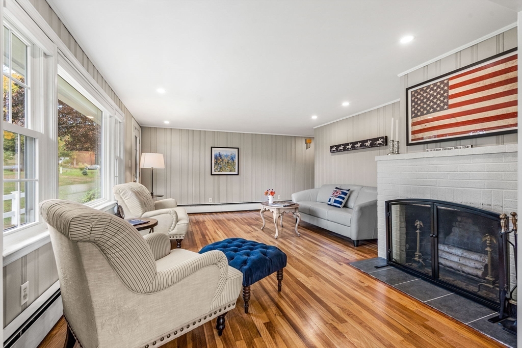 501 Farmers Row Groton, MA 01450 - Photo 6 of 19 a living room with furniture and a fireplace