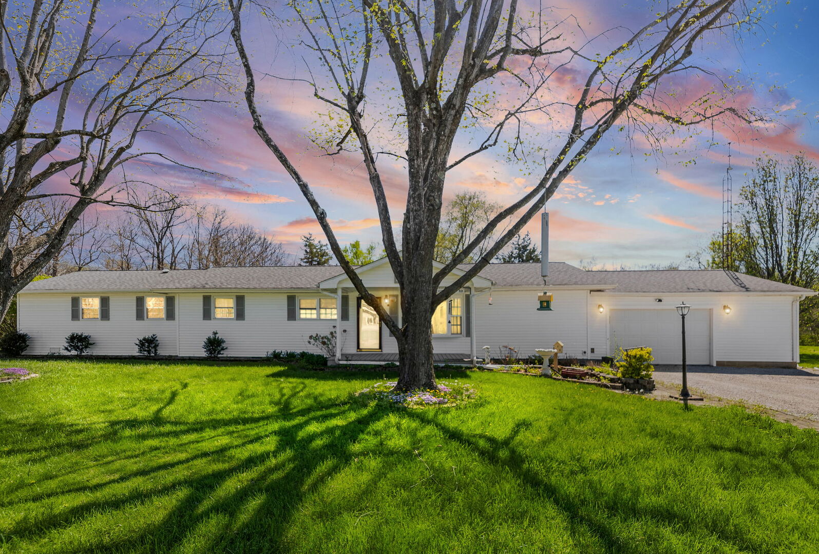 3192 Nation Road Salem, IL 62881 - Photo 2 of 39 a view of a house with a big yard and large trees