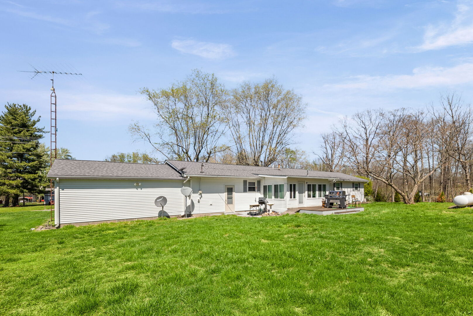 3192 Nation Road Salem, IL 62881 - Photo 5 of 39 a view of a house with a yard table and chairs