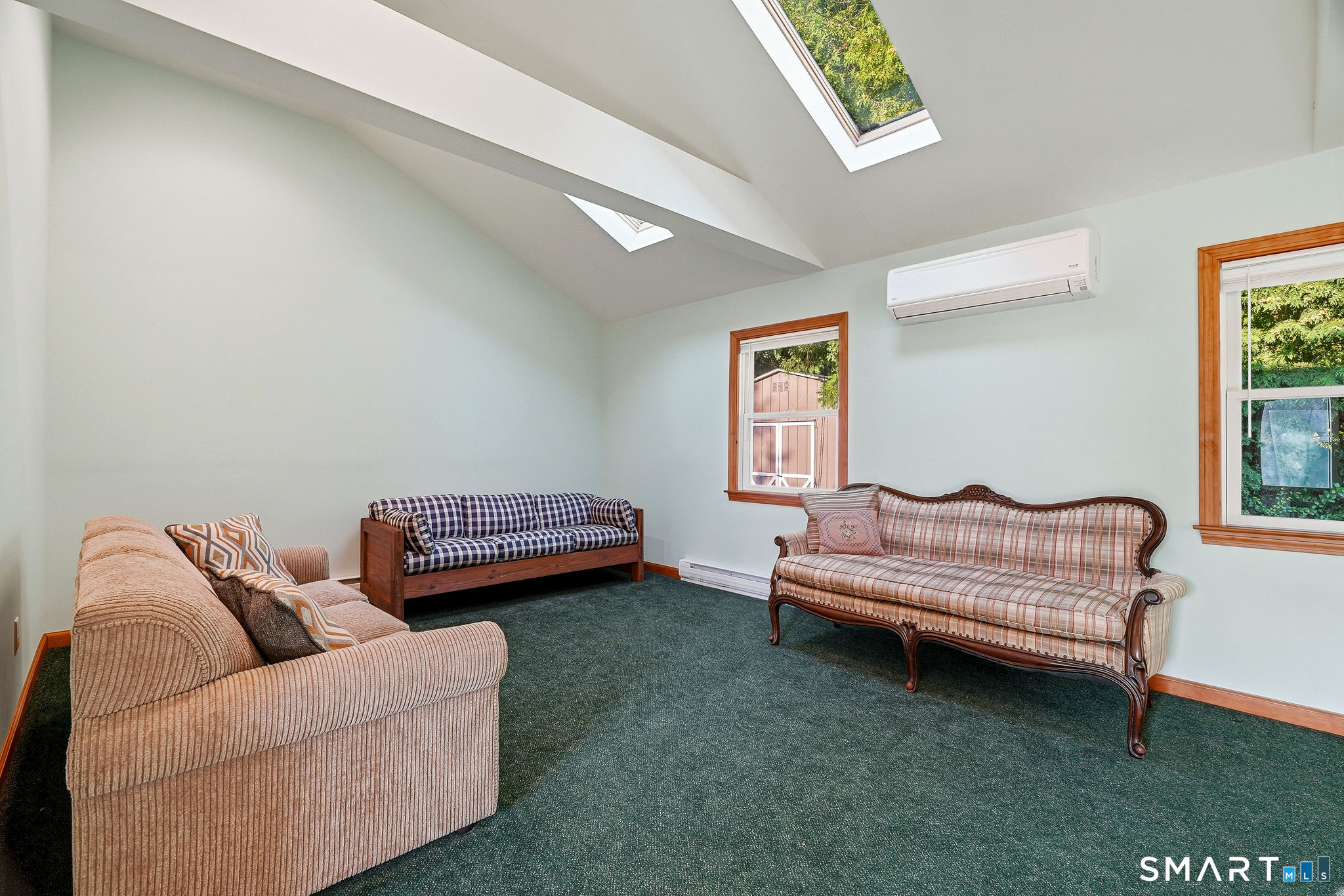 311 Brightwater Road Old Lyme, CT 06371 - Photo 27 of 39 Family room with vaulted ceiling