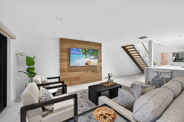 a spacious bathroom with a double vanity sink and a mirror