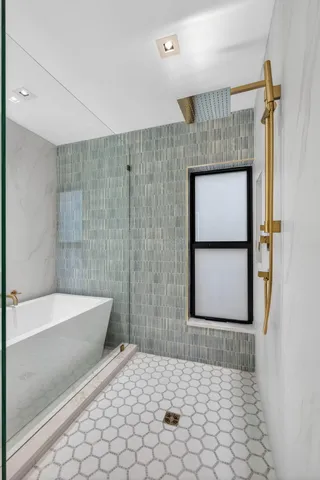 a view of a couches in patio of a house