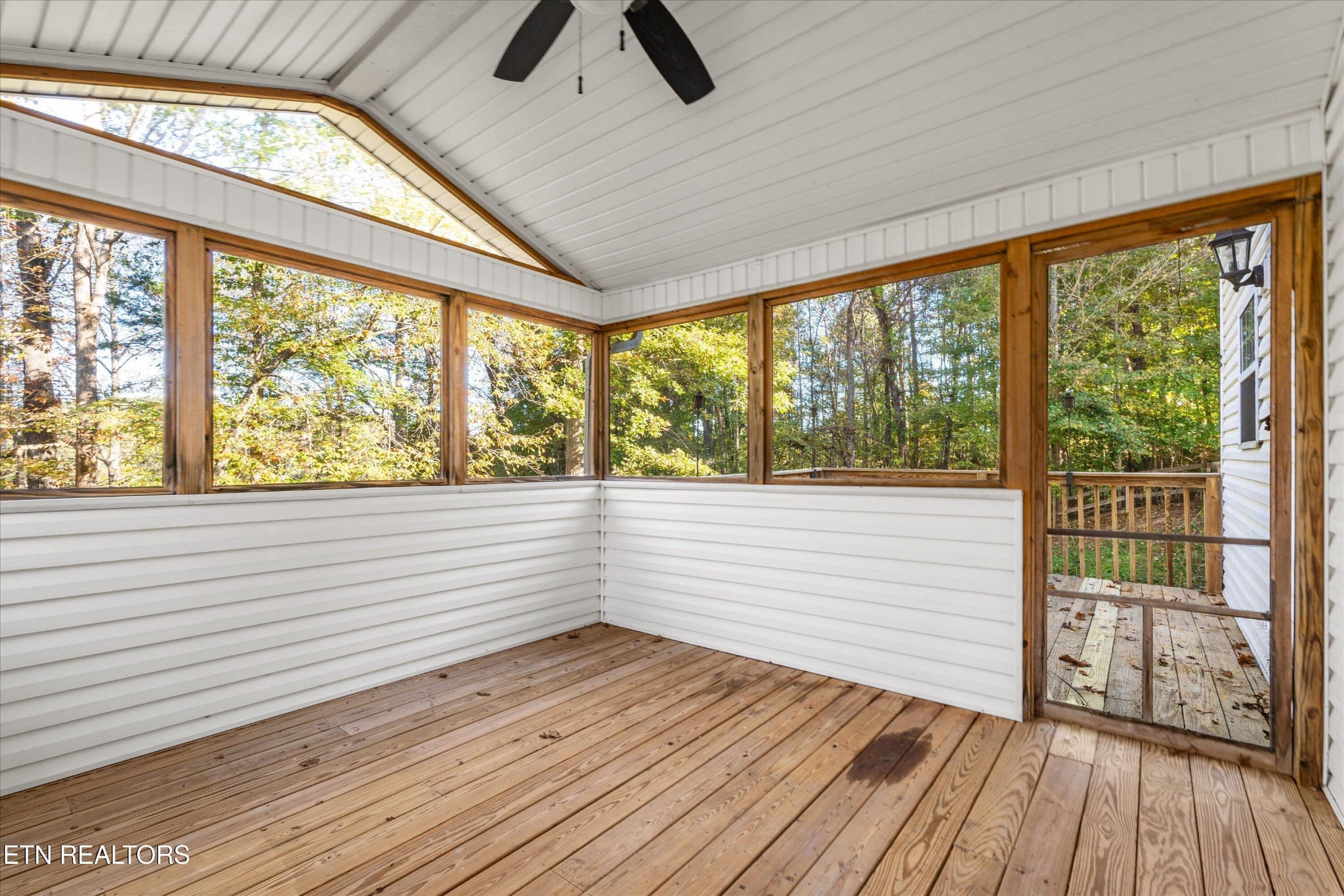 151 Huntington Lane Heiskell, TN 37754 - Photo 17 of 40 a view of small space with wooden floor and iron stairs