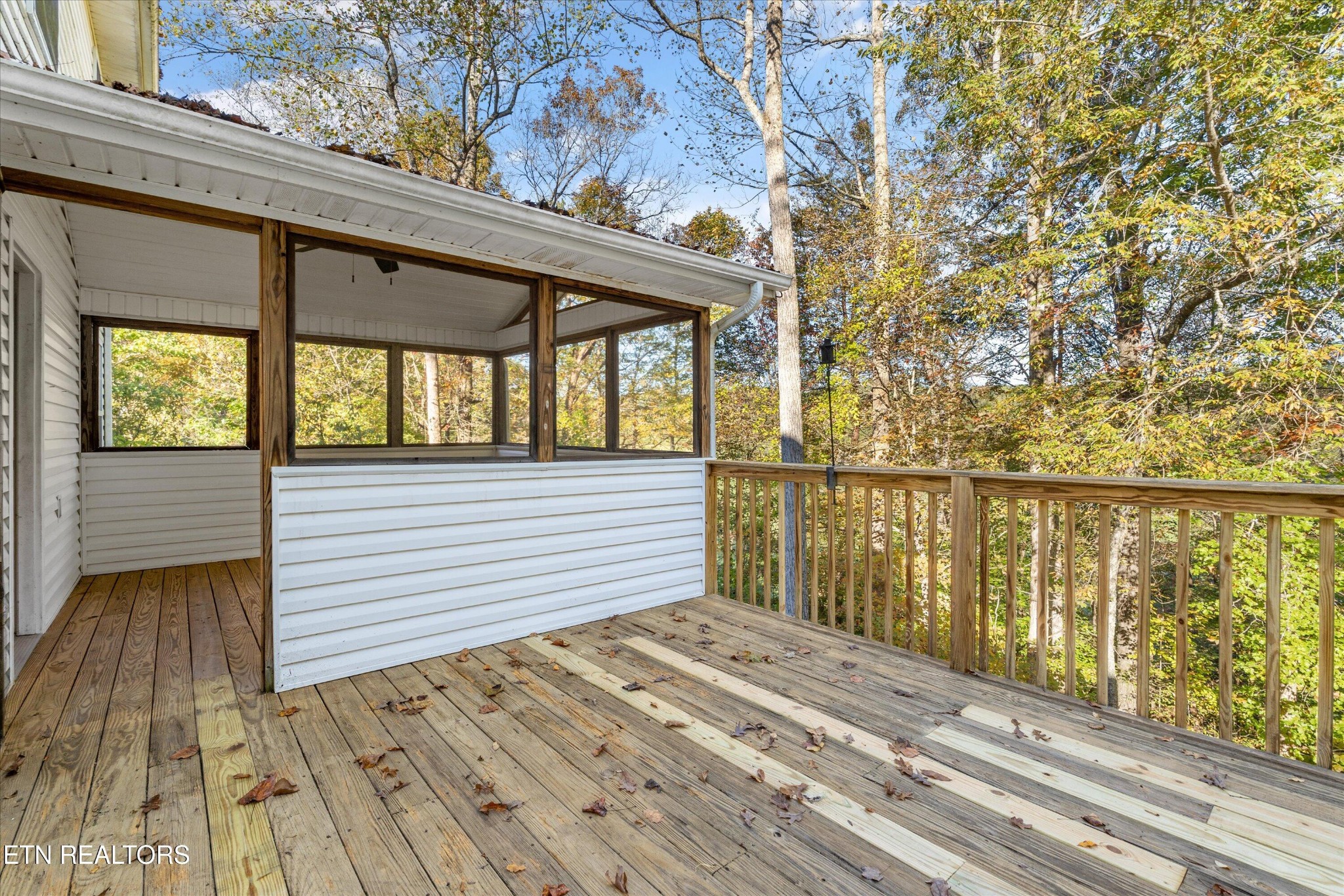 151 Huntington Lane Heiskell, TN 37754 - Photo 18 of 40 a view of a balcony with wooden floor