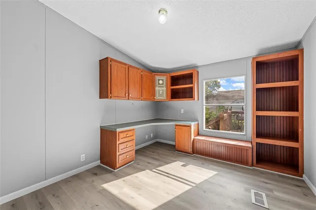 a room with furniture and a window