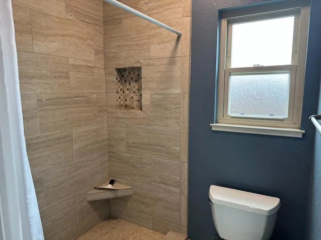 a view of a backyard and a patio