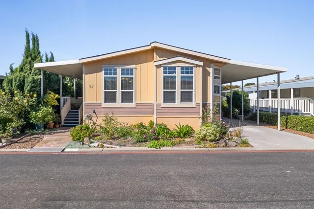 front view of a house with a yard