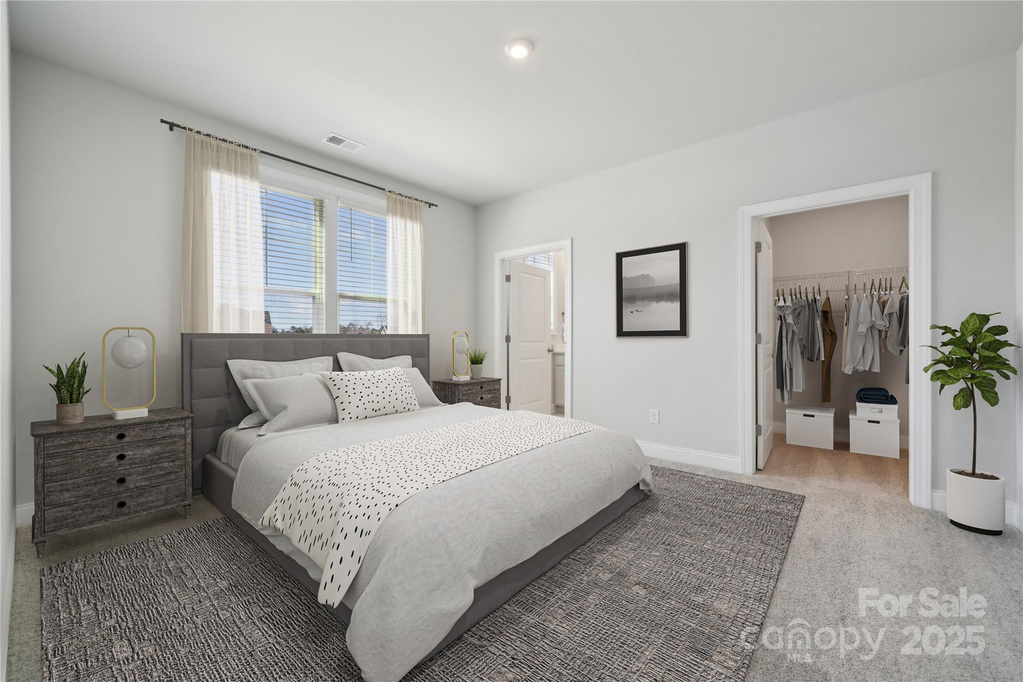 327 Alameda Way Matthews, NC 28104 - Photo 11 of 31 a bedroom with a large bed and potted plant