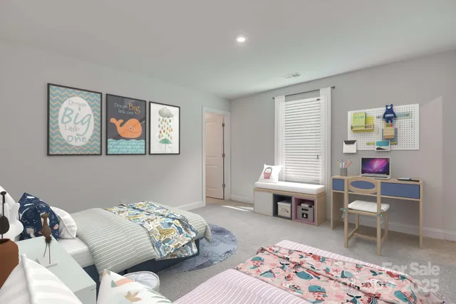 a bedroom with a bed and a desk