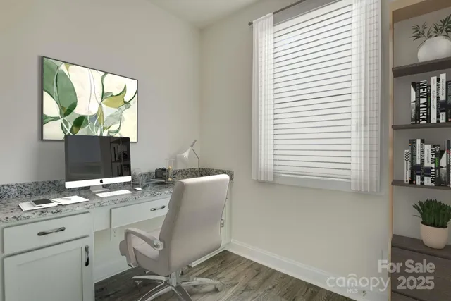 a workspace with furniture and window