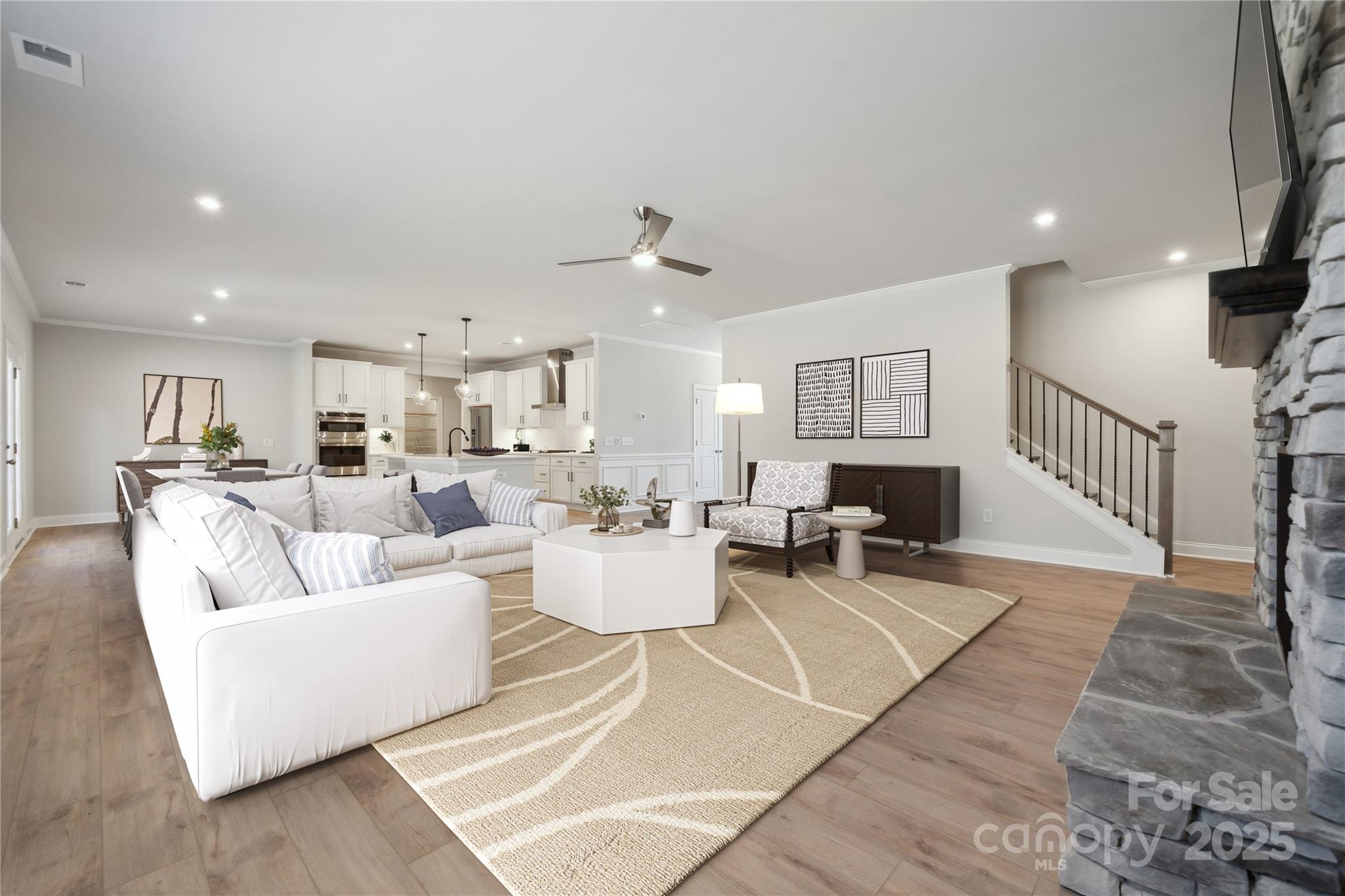 327 Alameda Way Matthews, NC 28104 - Photo 23 of 31 a living room with furniture white walls and white walls
