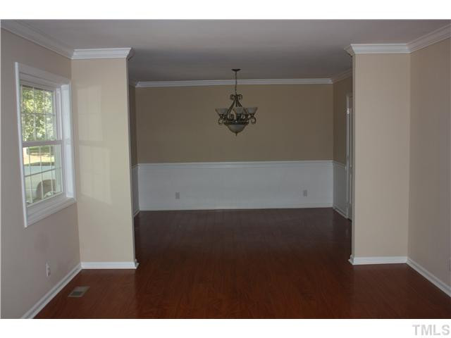 912 Brandon Road Durham, NC 27713 - Photo 4 of 22 Formal living room off front entrance connects to formal dining. Living Room