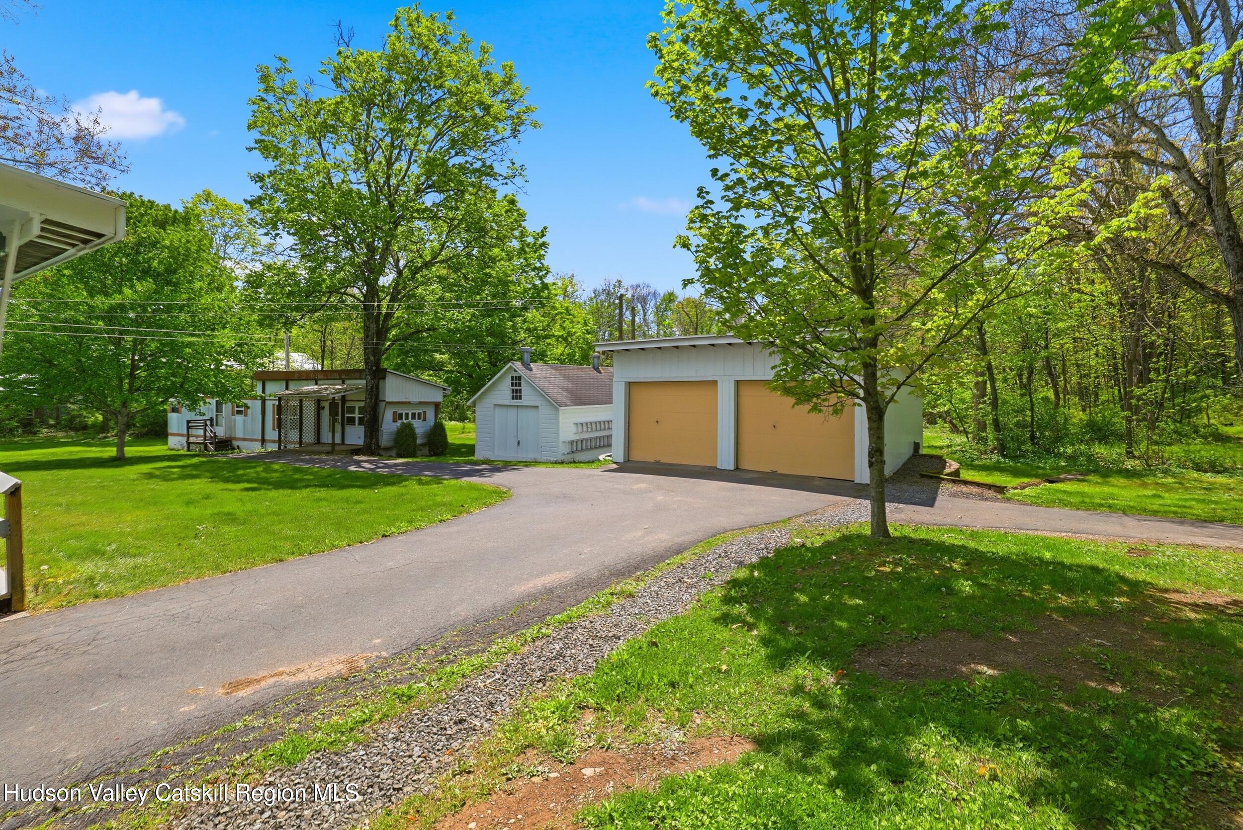 294 Kyserike Road Accord, NY 12404 - Photo 38 of 46 a house with a garden and trees