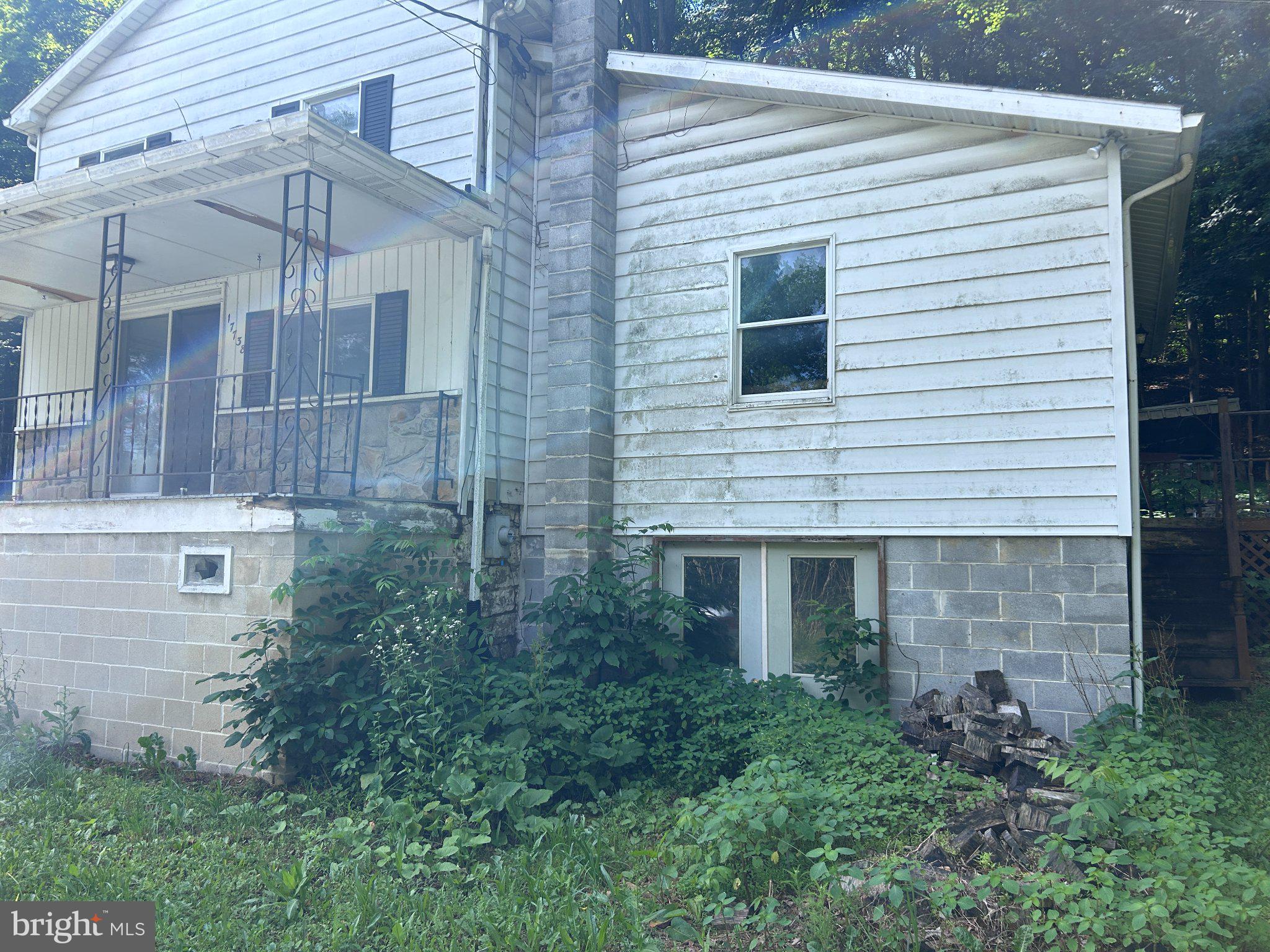 17738 Amberson Road Spring Run, PA 17262 - Photo 2 of 23 Charming fixer-upper with lush greenery.