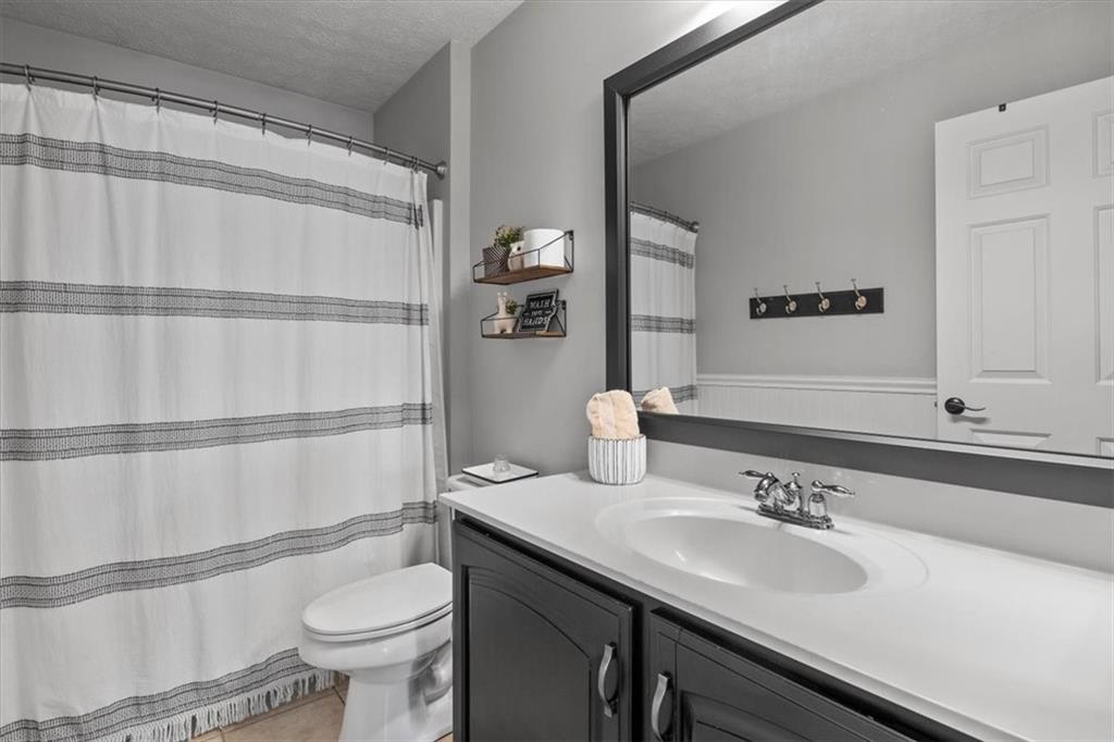 82 Diebold Road McKees Rocks, PA 15136 - Photo 22 of 30 a bathroom with a sink toilet and shower