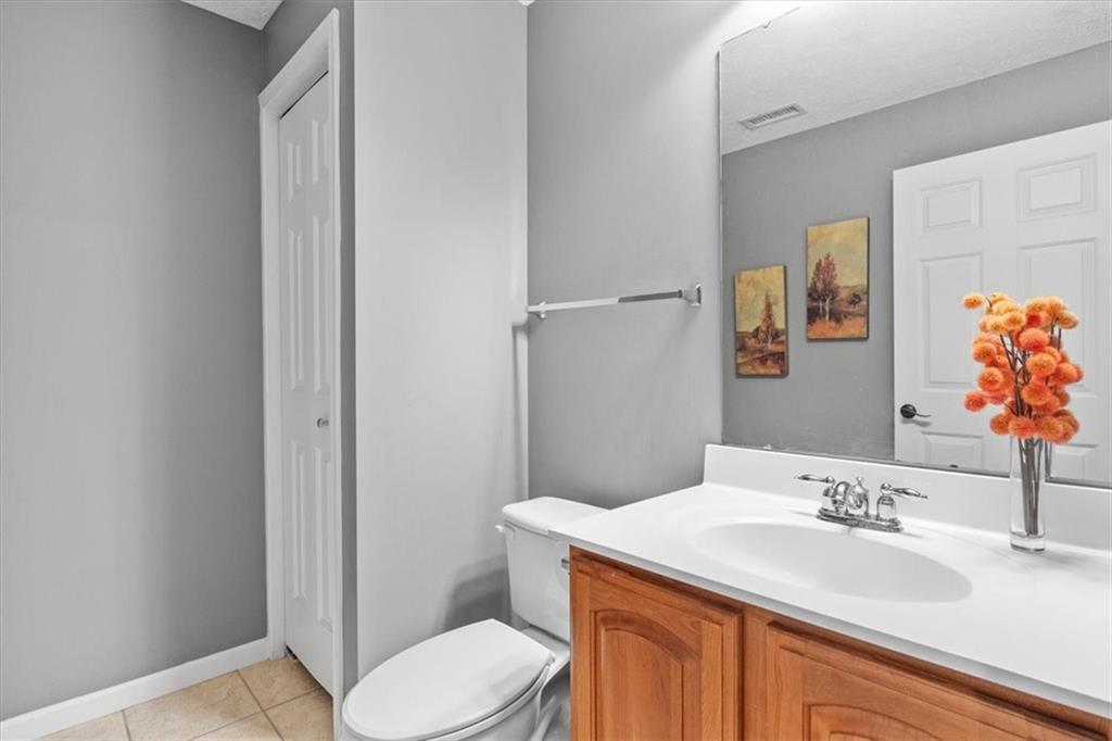 82 Diebold Road McKees Rocks, PA 15136 - Photo 24 of 30 a bathroom with a sink toilet and vanity