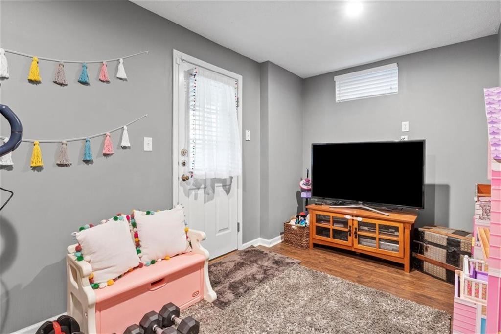 82 Diebold Road McKees Rocks, PA 15136 - Photo 25 of 30 a living room with furniture and a flat screen tv
