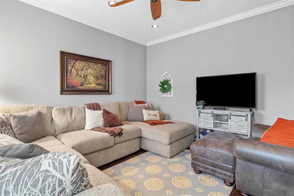 82 Diebold Road McKees Rocks, PA 15136 - Photo 5 of 30 a living room with furniture and a flat screen tv