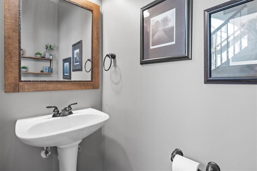 82 Diebold Road McKees Rocks, PA 15136 - Photo 6 of 30 a bathroom with a sink and a mirror
