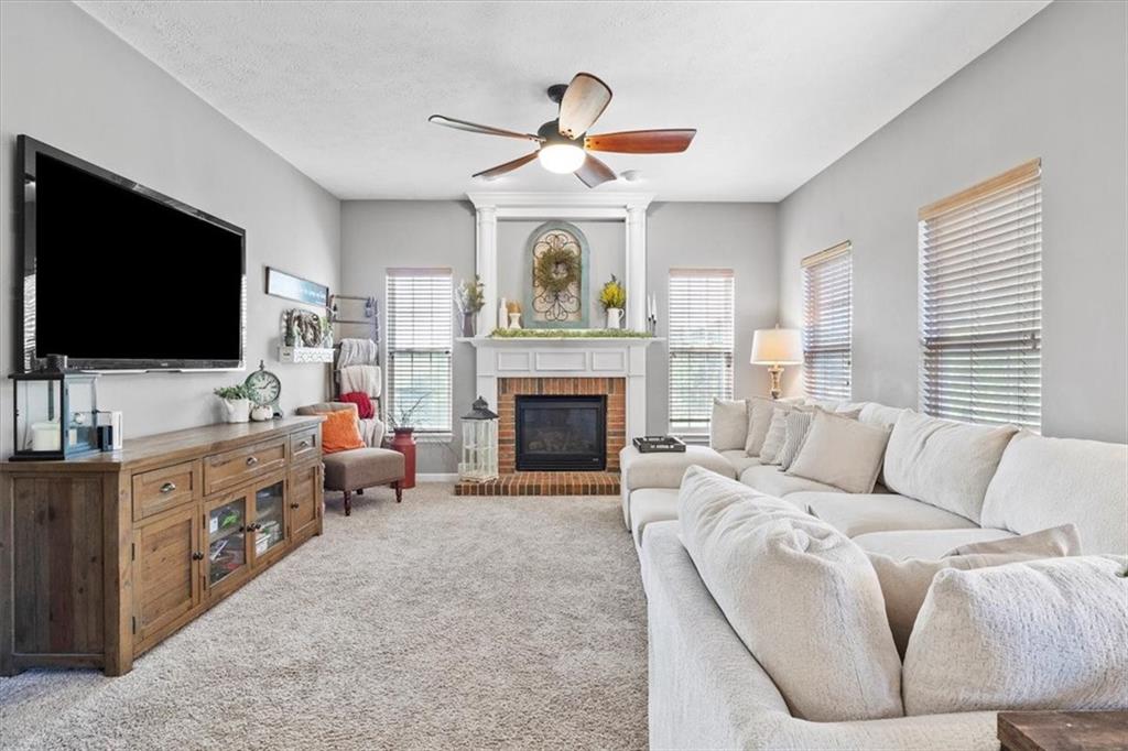 82 Diebold Road McKees Rocks, PA 15136 - Photo 7 of 30 a living room with furniture and a flat screen tv