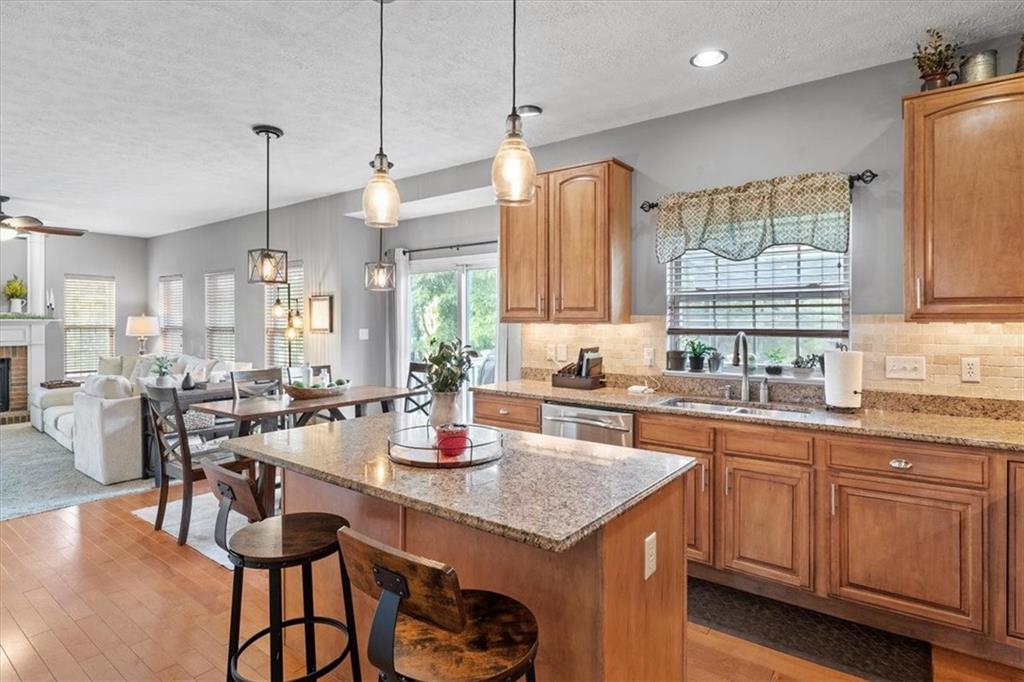 82 Diebold Road McKees Rocks, PA 15136 - Photo 8 of 30 a kitchen with center island table and chairs
