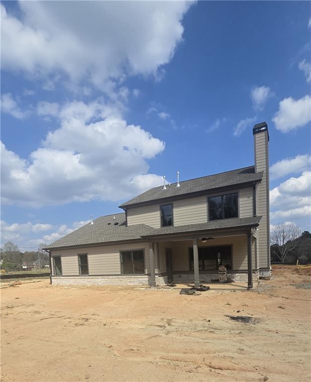 410 Youth Jersey Road Covington, GA 30014 - Photo 2 of 2 a front view of a house with a yard