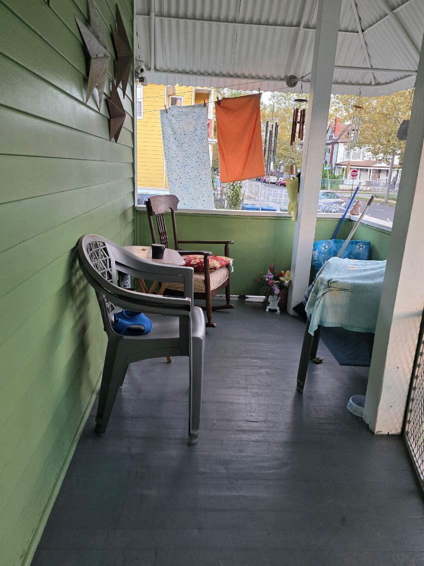 274 Park Street Bridgeport, CT 06608 - Photo 20 of 28 a room with furniture and a window